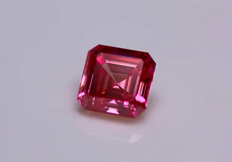 A pink asscher cut memorial diamond.